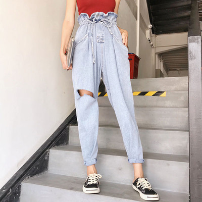 Модерни дамски дънки с висока талия и разкъсани мотиви в светъл цвят