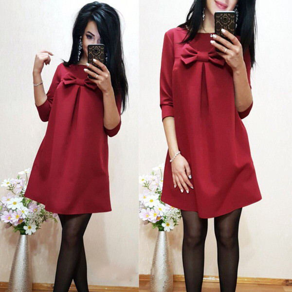 Модерна дамска рокля широк модел  с елемент панделка на бюста 